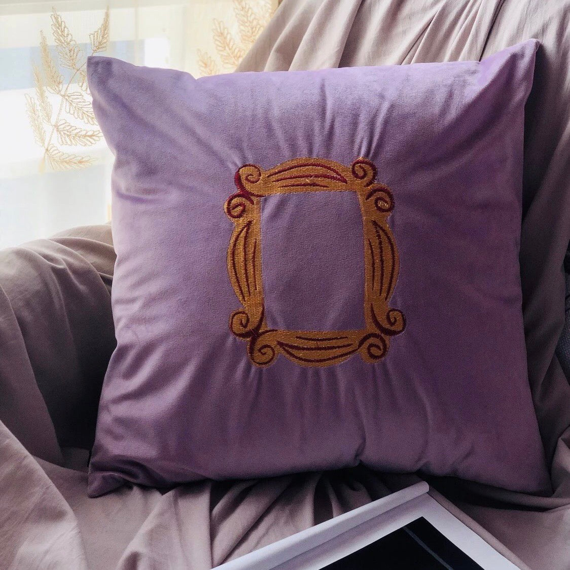 Monica’s Peephole Velvet Throw Pillow